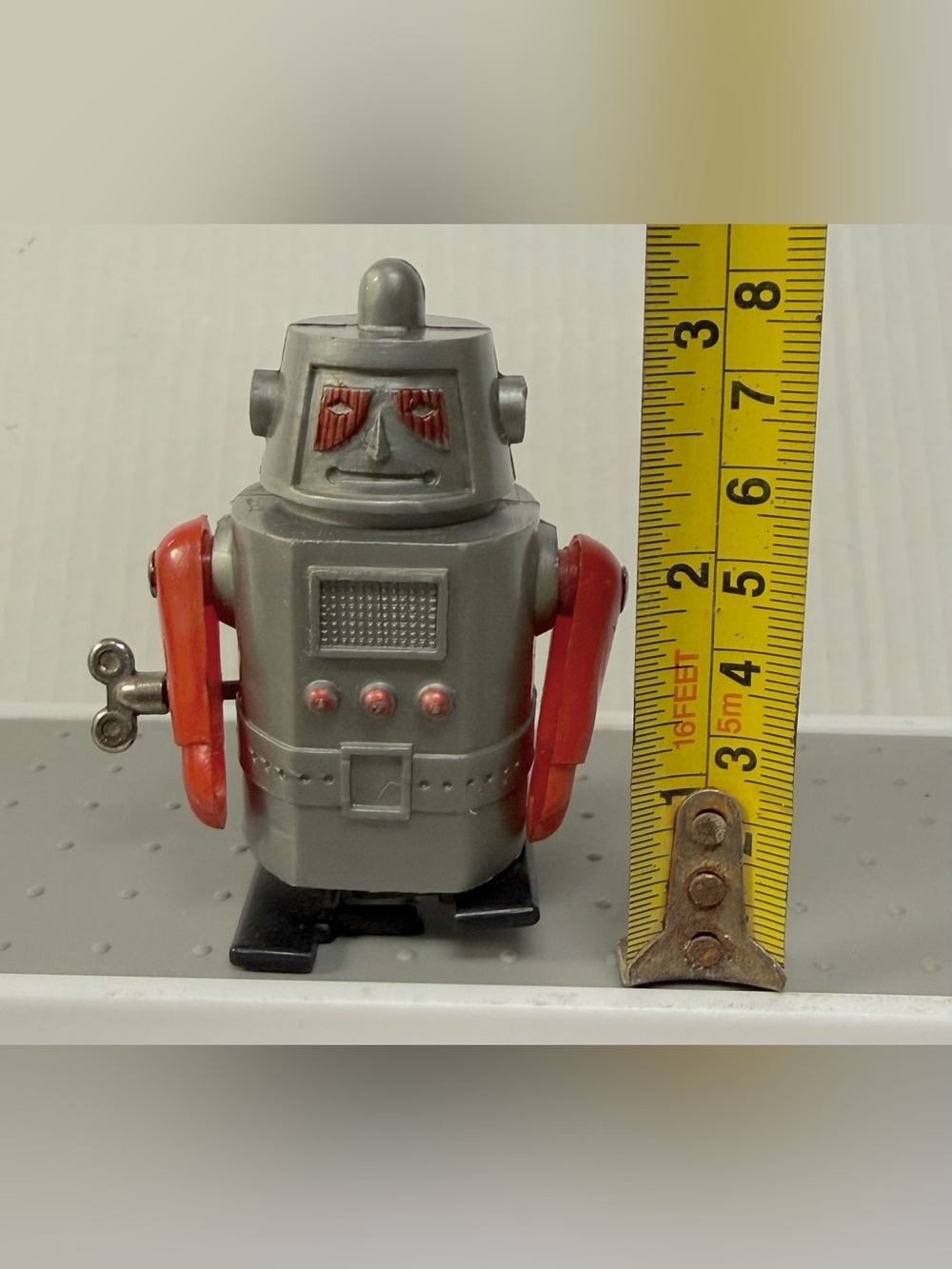 Nostalgic Plastic Clockwork "Grumpy" Robot Figure - Vintage Style